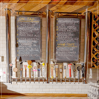 Hanging Draft Beer Tower With Beers On Tap