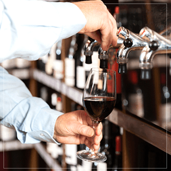 Wine Poured From A Tap