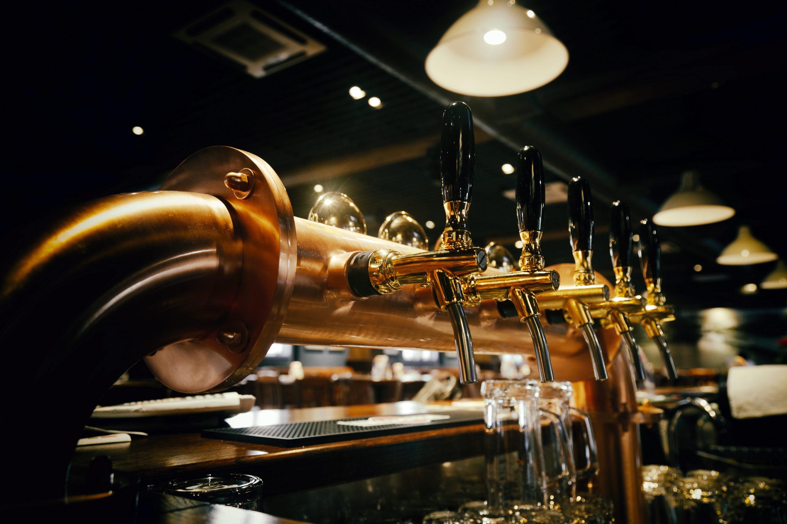Taps in a bar, one of the top beverage trends in 2022