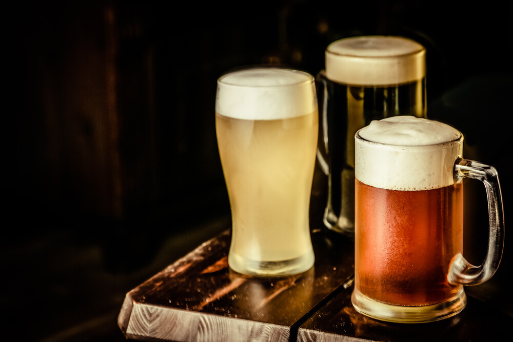 A selection of different beer glass types in a pub